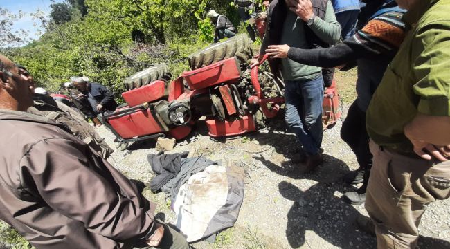 DEVRİLEN TRAKTÖRÜN ALTINDA KALAN ÇİFTÇİ HAYATINI KAYBETTİ