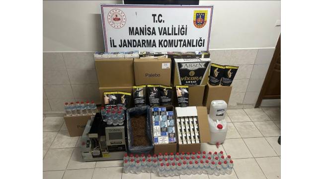  Manisa'nın Akhisar İlçesinde Kaçakçılık Operasyonu: 40 Bin Makaron Sigara ve Kaçak Alkol Ele Geçirildi